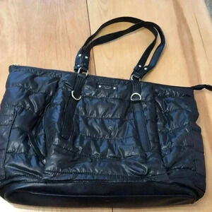 Tutilo New York black quilted polyester bag with leather trim.